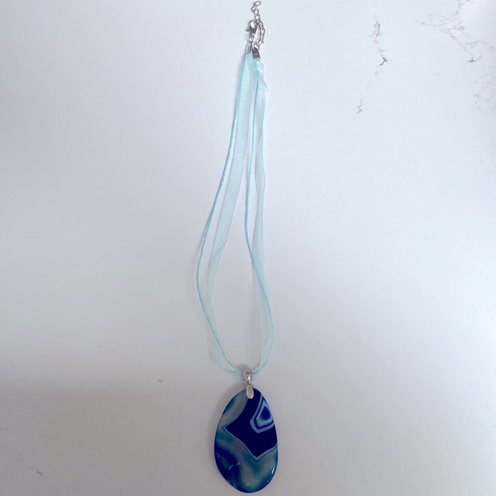 Smooth gemstone necklace, blue swirly tones, new.